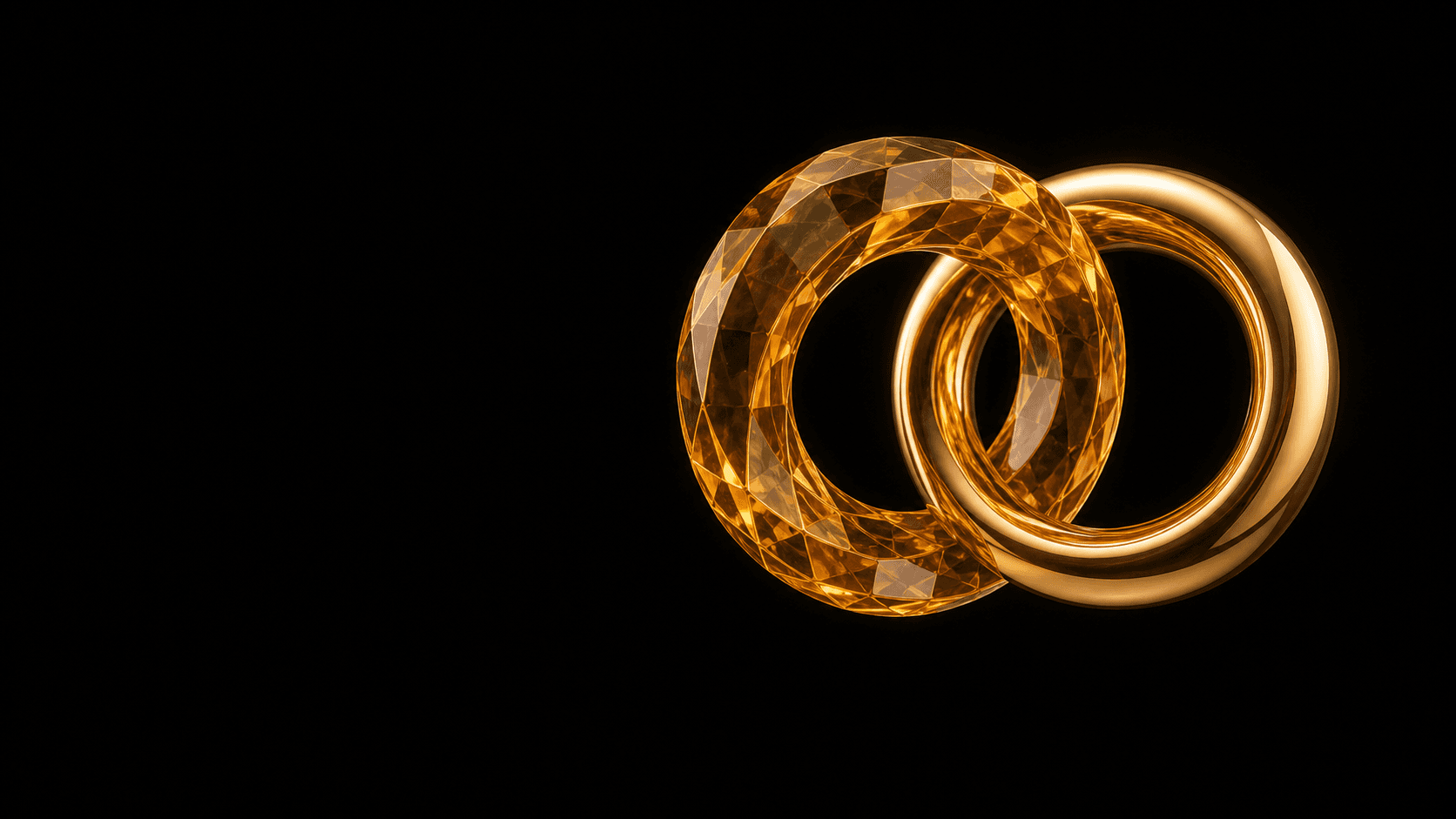 Zwei verbundene Zeqra Fusion Elemente aus Gold und Amberglas